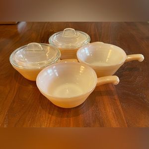 Fire-King peach lustre bowls with handles.